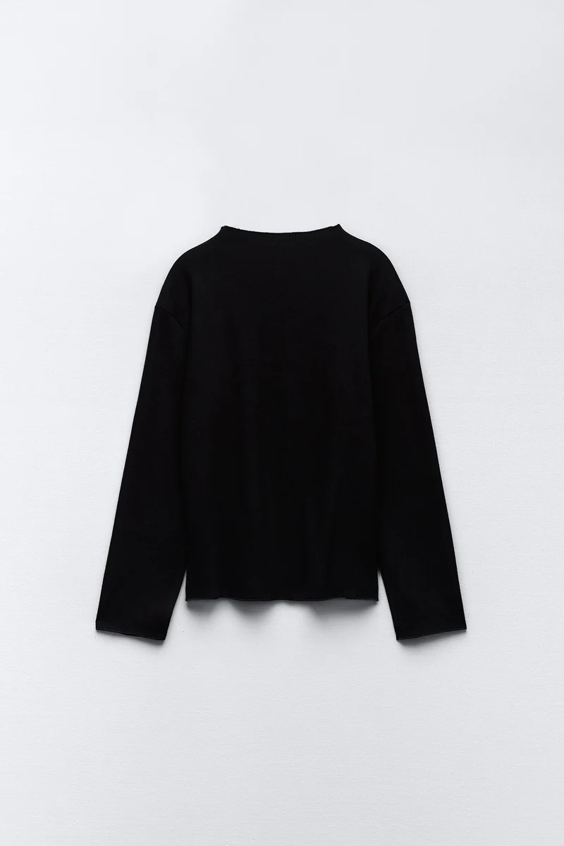 Sweater with a subtle front seam