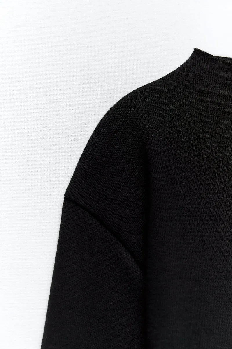 Sweater with a subtle front seam