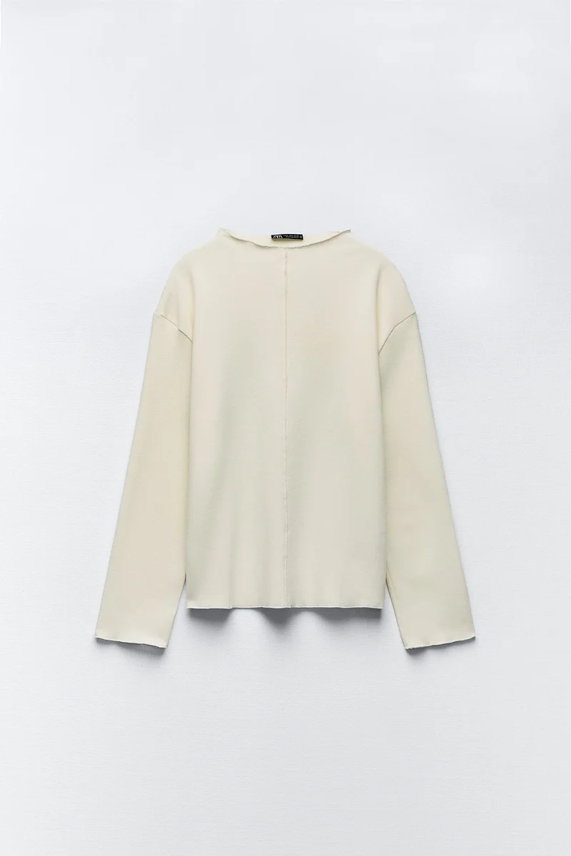 Sweater with a subtle front seam