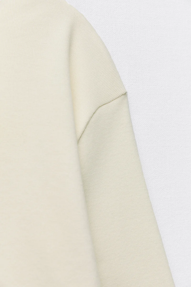 Sweater with a subtle front seam