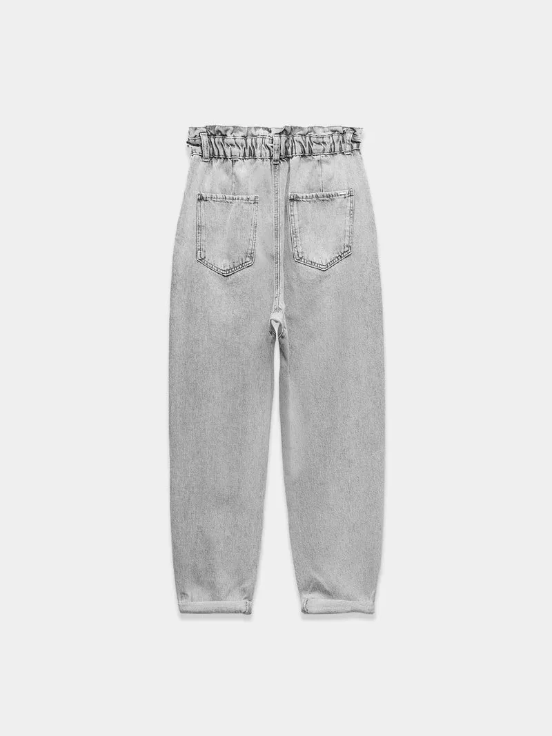 Elevated-rise, loose-fitting paperbag jeans with a high waist.