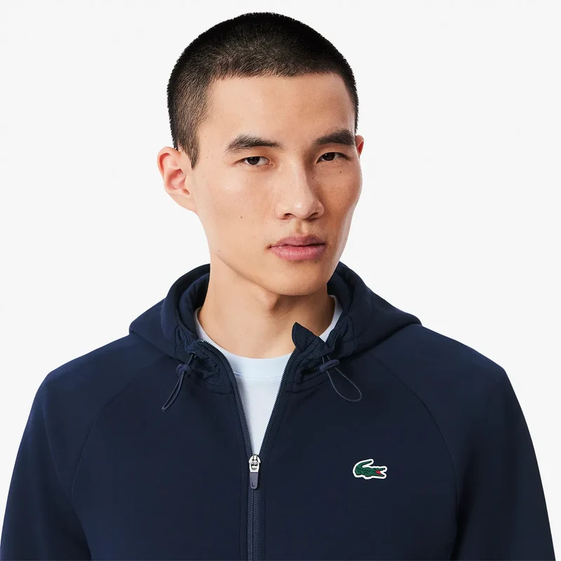 SWEAT LACOSTE CORE PERRFORMANCE A CAPUCHE FZ MESH