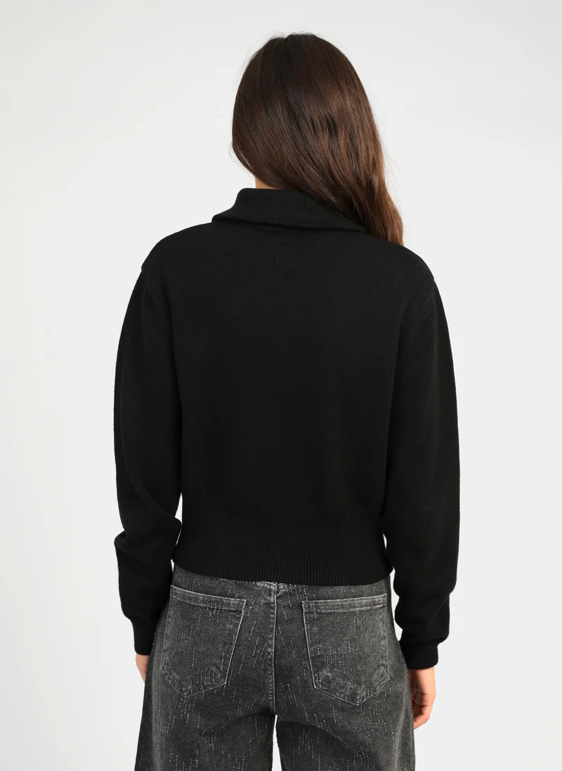 PULL NAZARIO noir