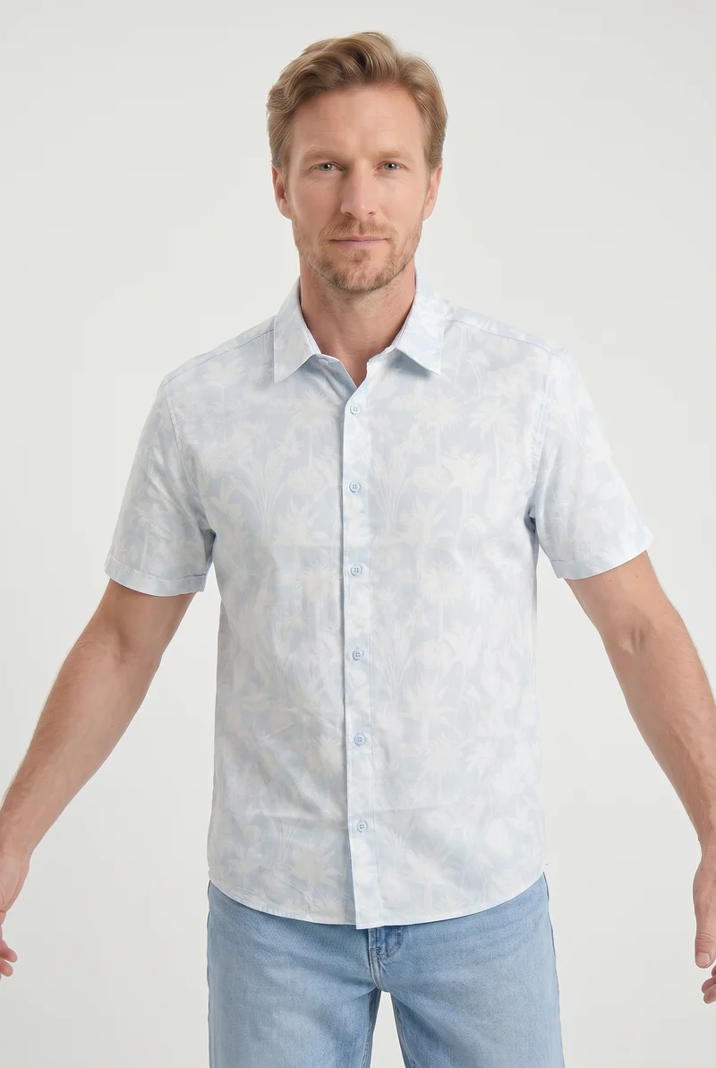 La chemise tropicale à manches courtes bleu