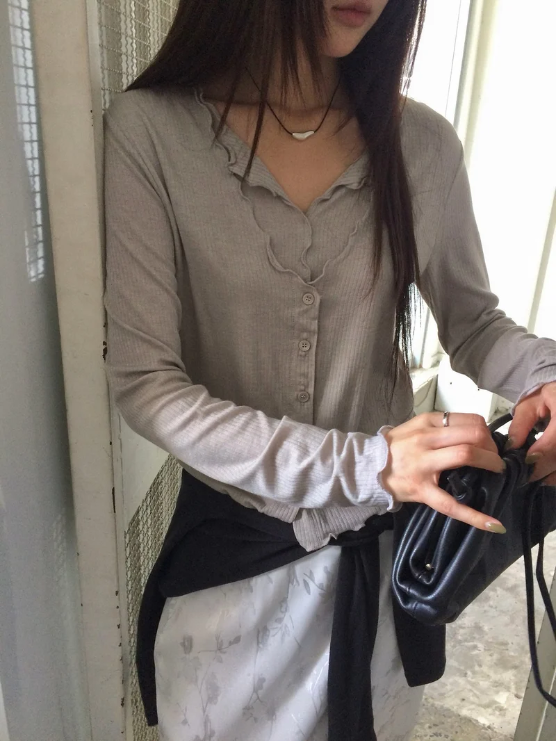 Anou Wave Hem Ribbed Button-Front Long Sleeve Top