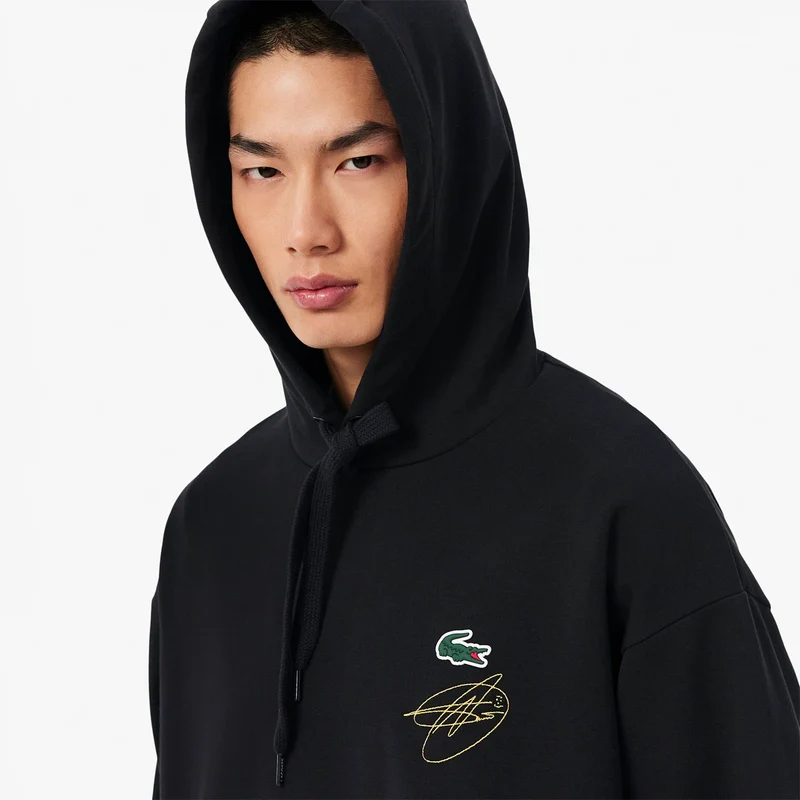 SWEAT A CAPUCHE LACOSTE DJOKOVIC ON COURT