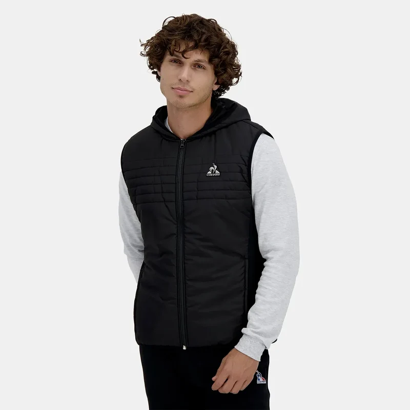 DOUDOUNE LE COQ SPORTIF HYBRIDE SANS MANCHES A CAPUCHE
