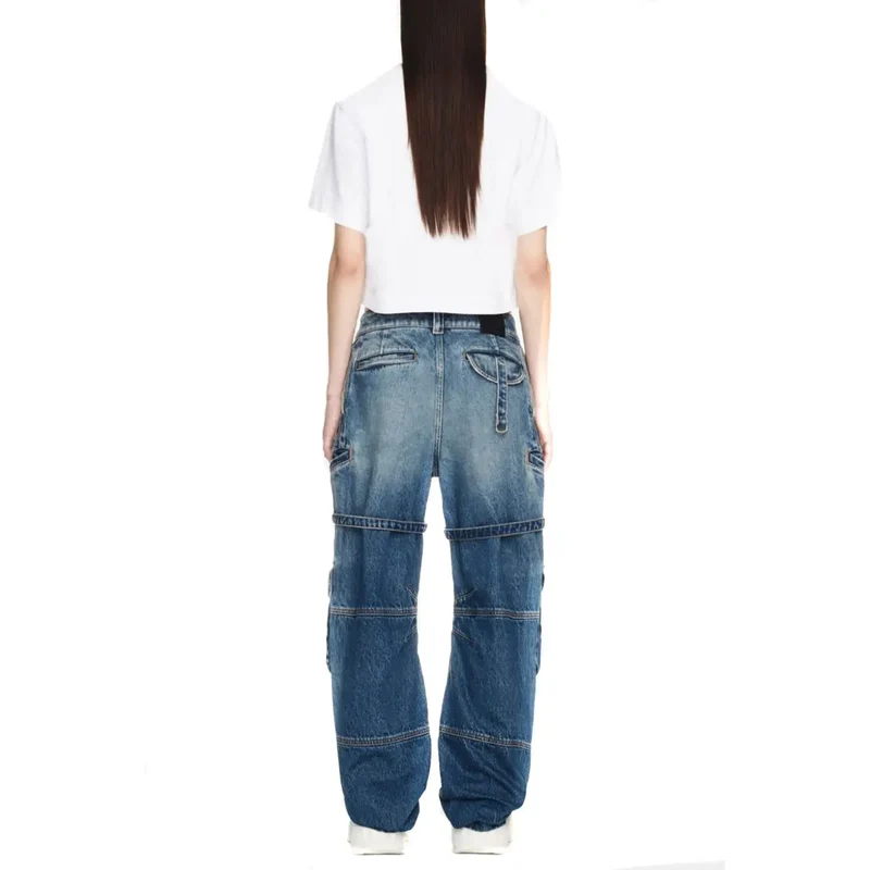Jeans femme en coton écru avec braguette zippée et finition usée