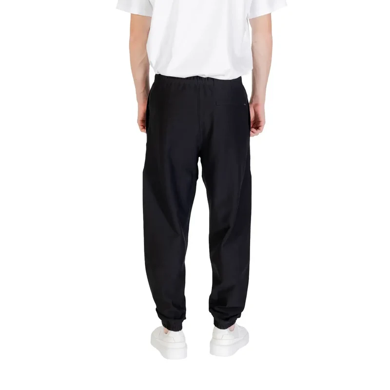 Pantalon de survêtement noir Calvin Klein avec poignets élastiques