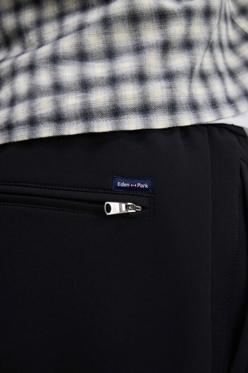Pantalon à taille élastiquée en nylon stretch technique noir coupe Modern