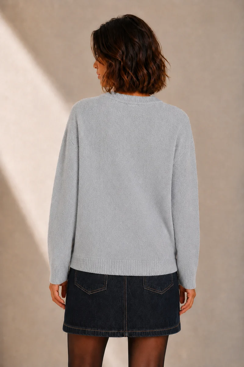 Le chandail en tricot graphique