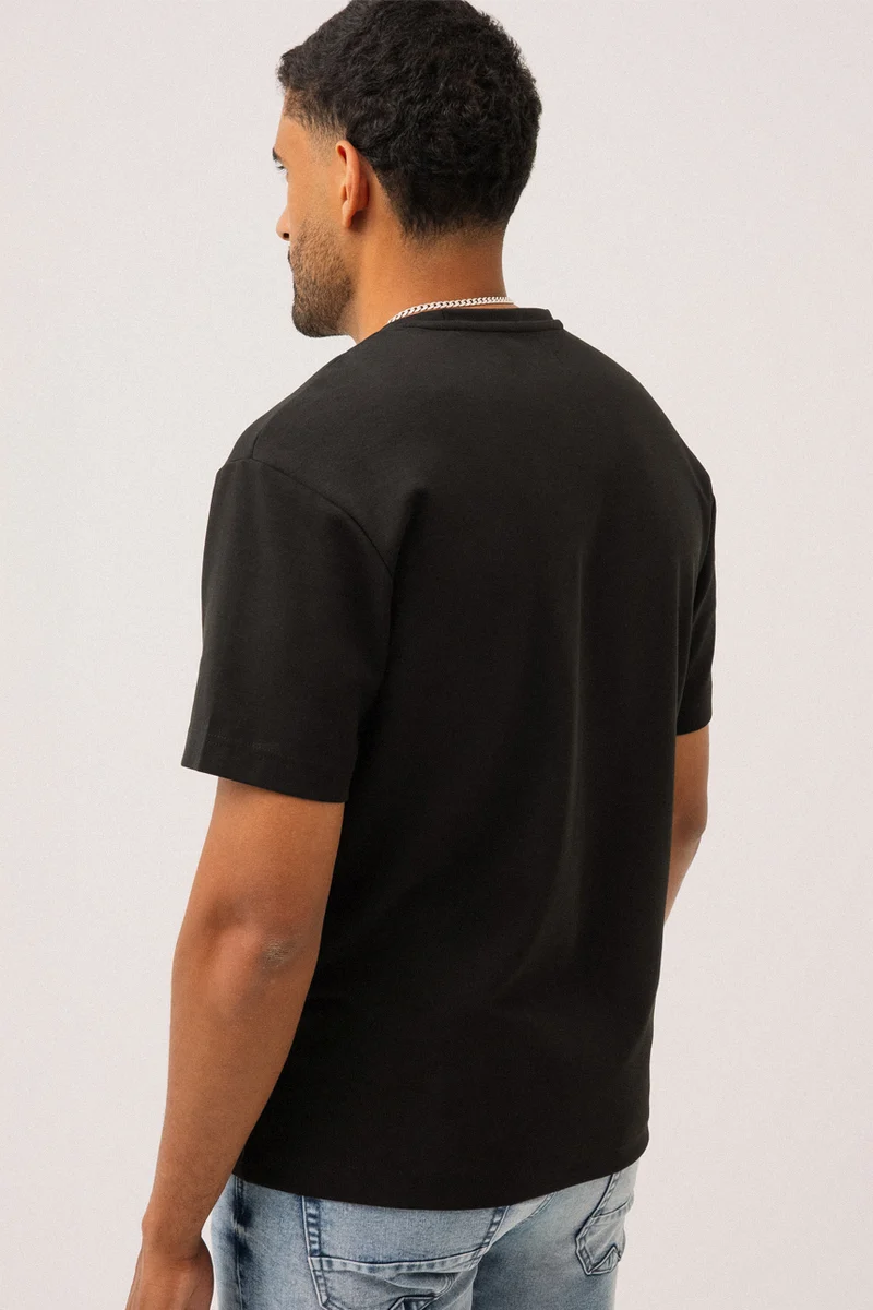 Le t-shirt en scuba par Projek Raw