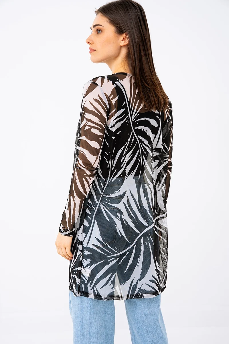 Le cardigan long diaphane