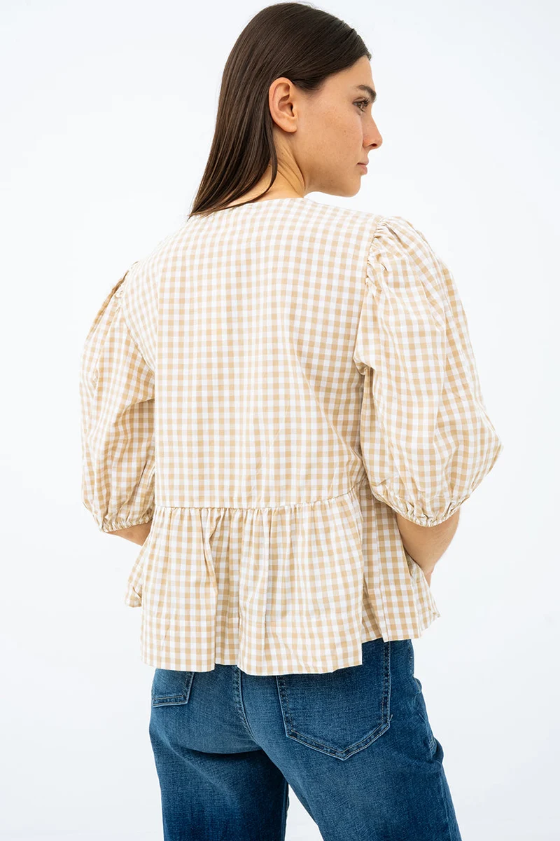 La blouse légère à carreaux