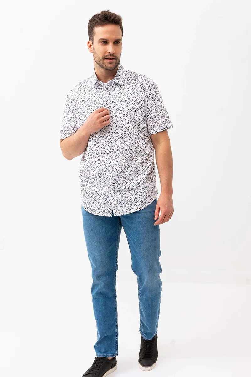 La chemise imprimée all-over feuille abstraite