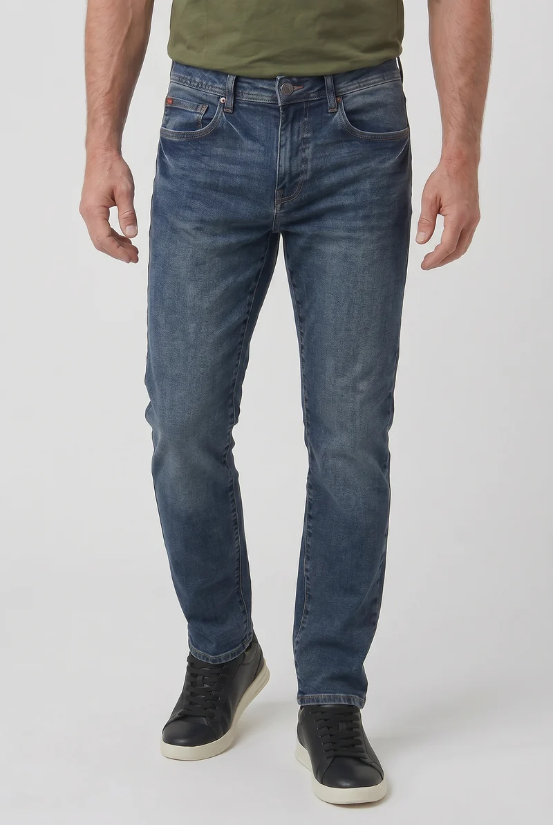 Le jean slim extensible foncé