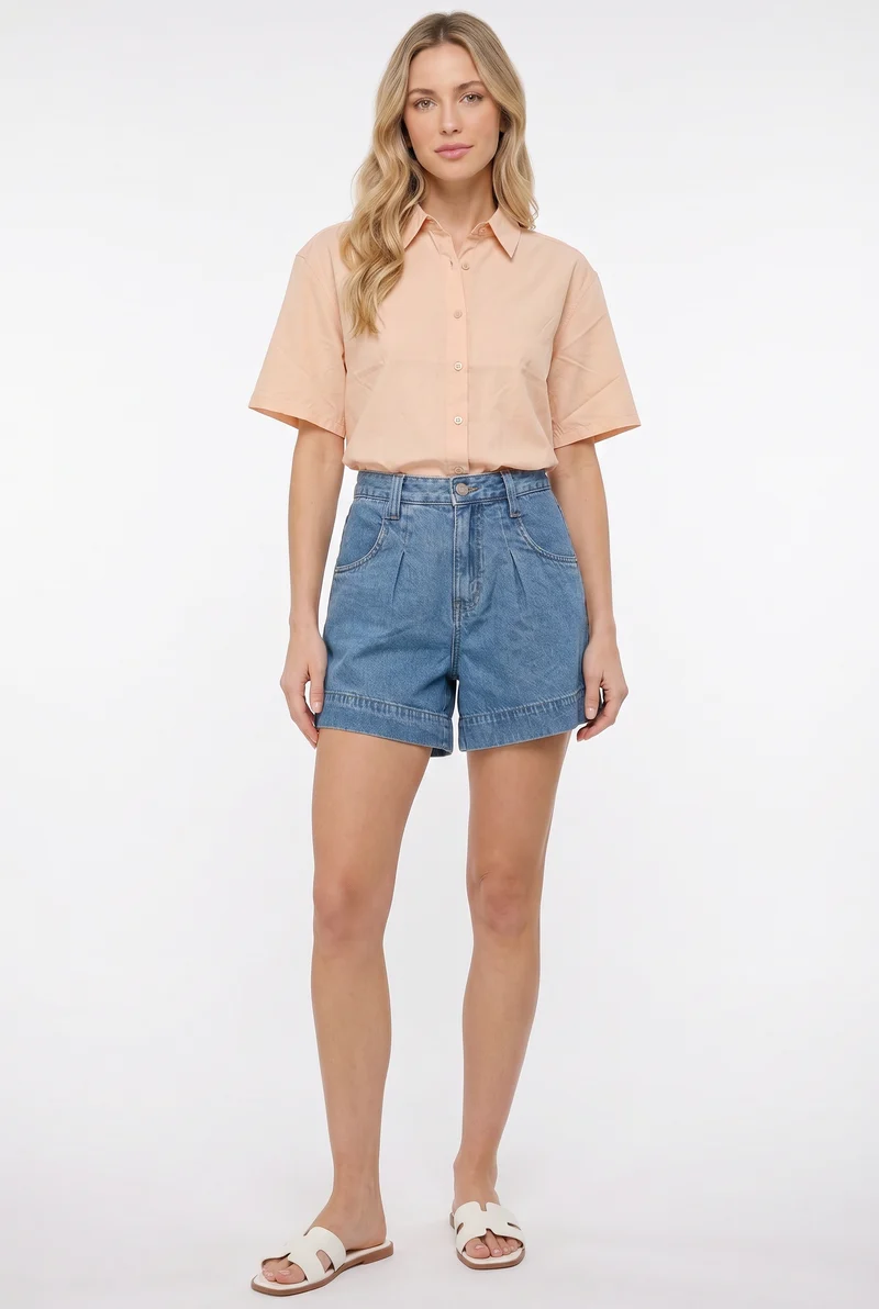 Le short à plis taille haute