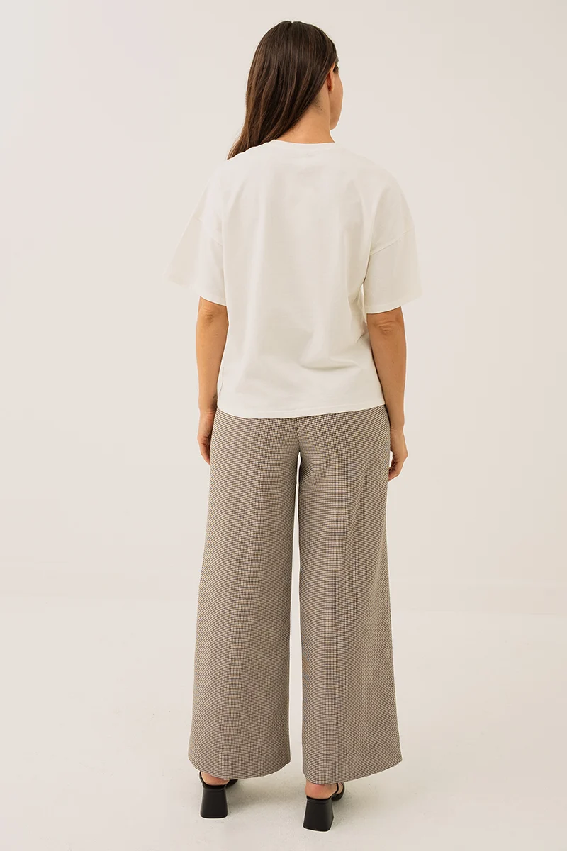Le pantalon pied de poule brun
