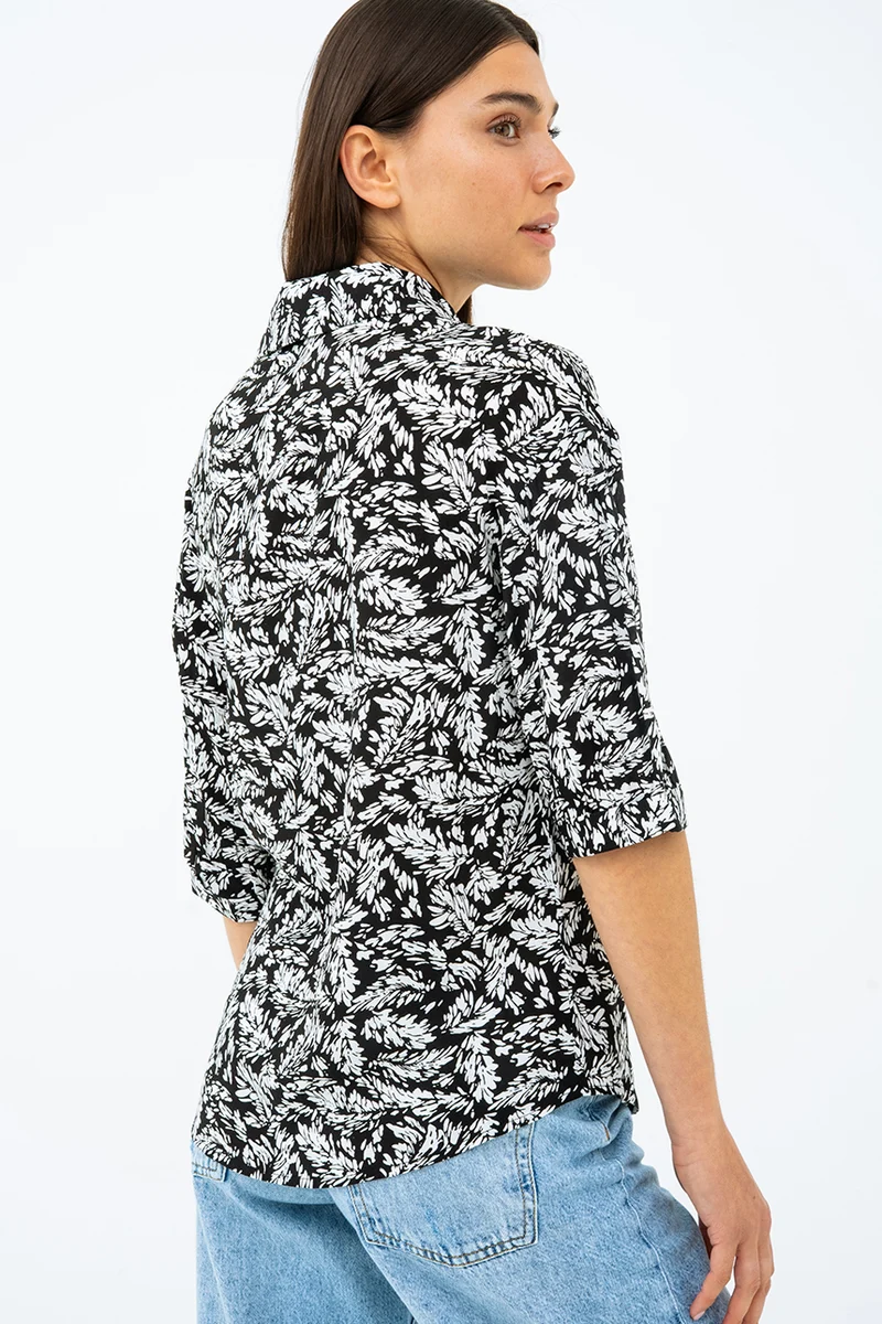 La blouse imprimée manches ballon bouton assorti