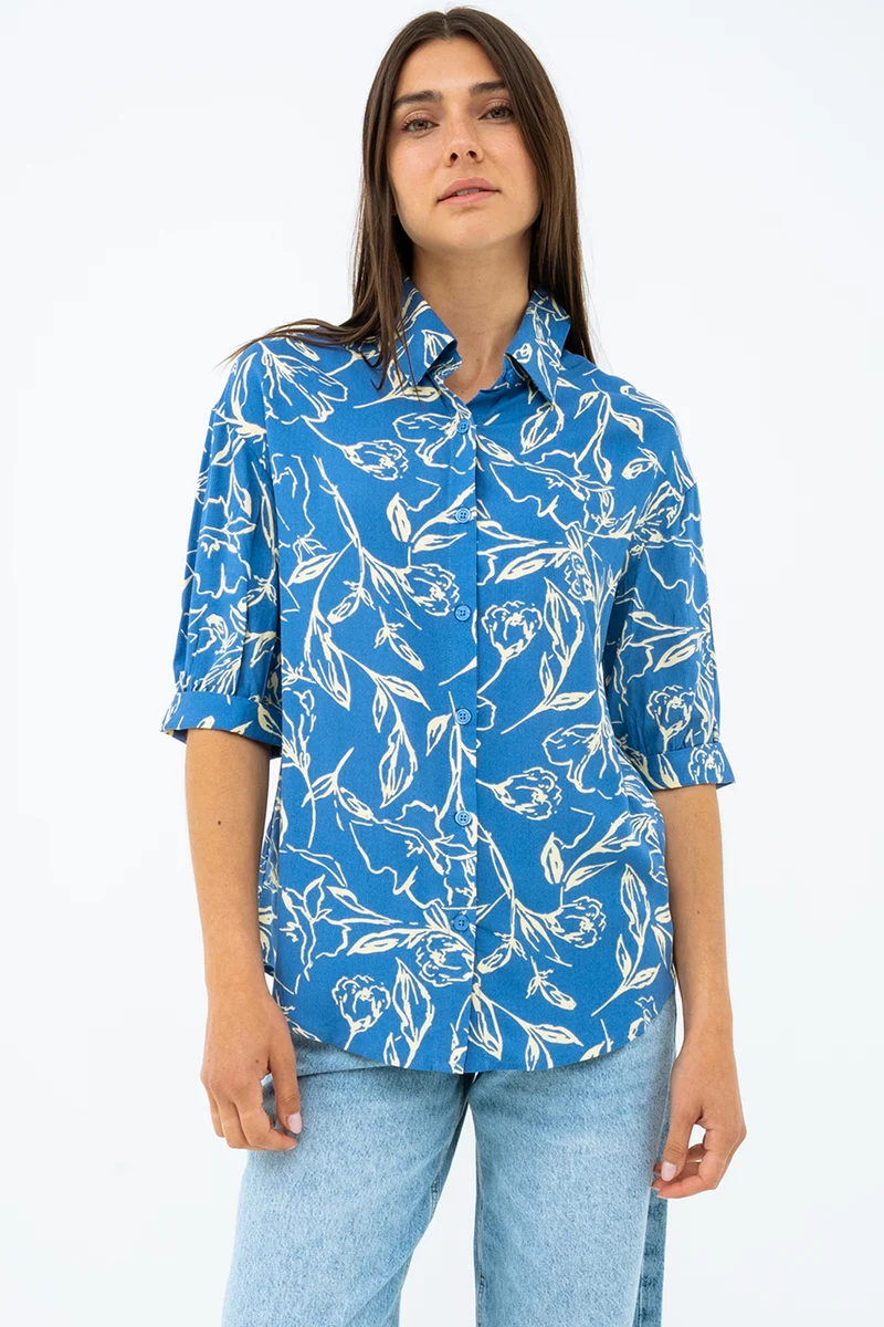 La blouse imprimée manches ballon bouton assorti