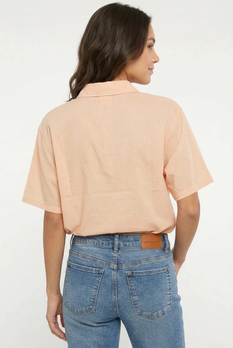 La chemise fluide à manches courtes blanche