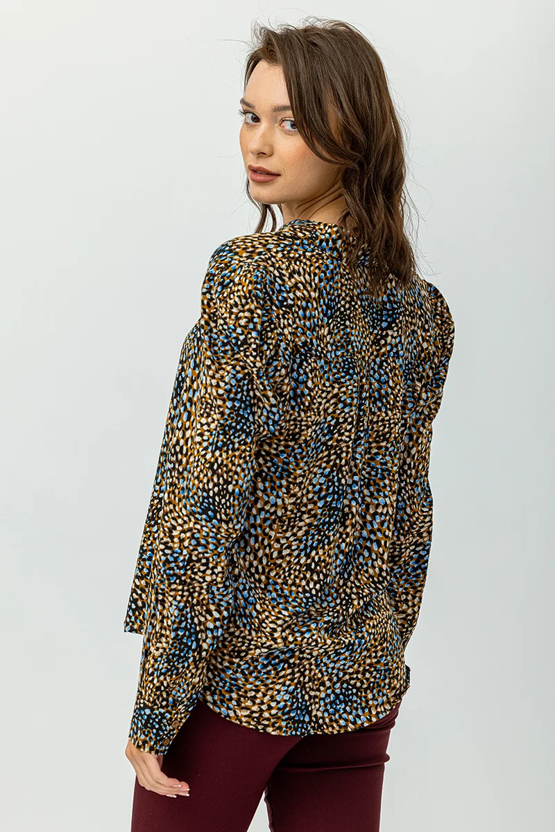 La blouse manches bouffantes imprimé abstrait