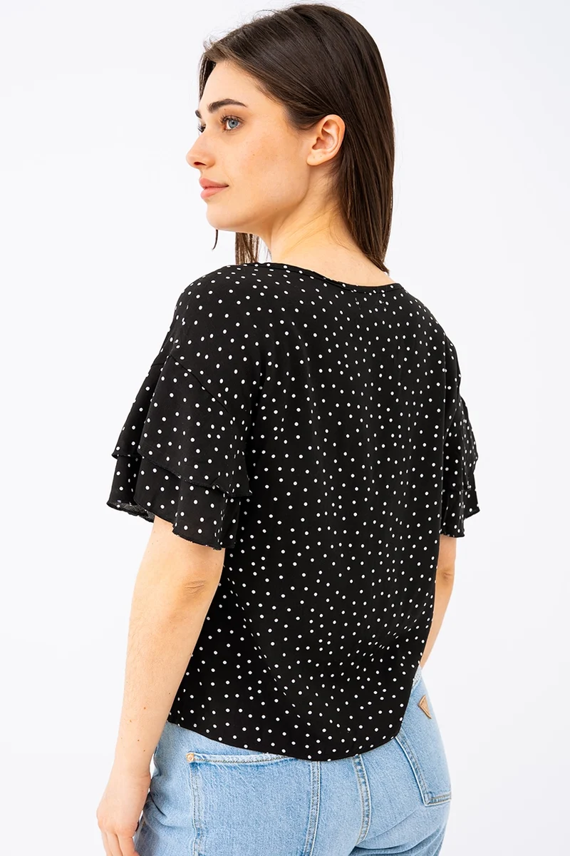 La blouse à pois col bateau