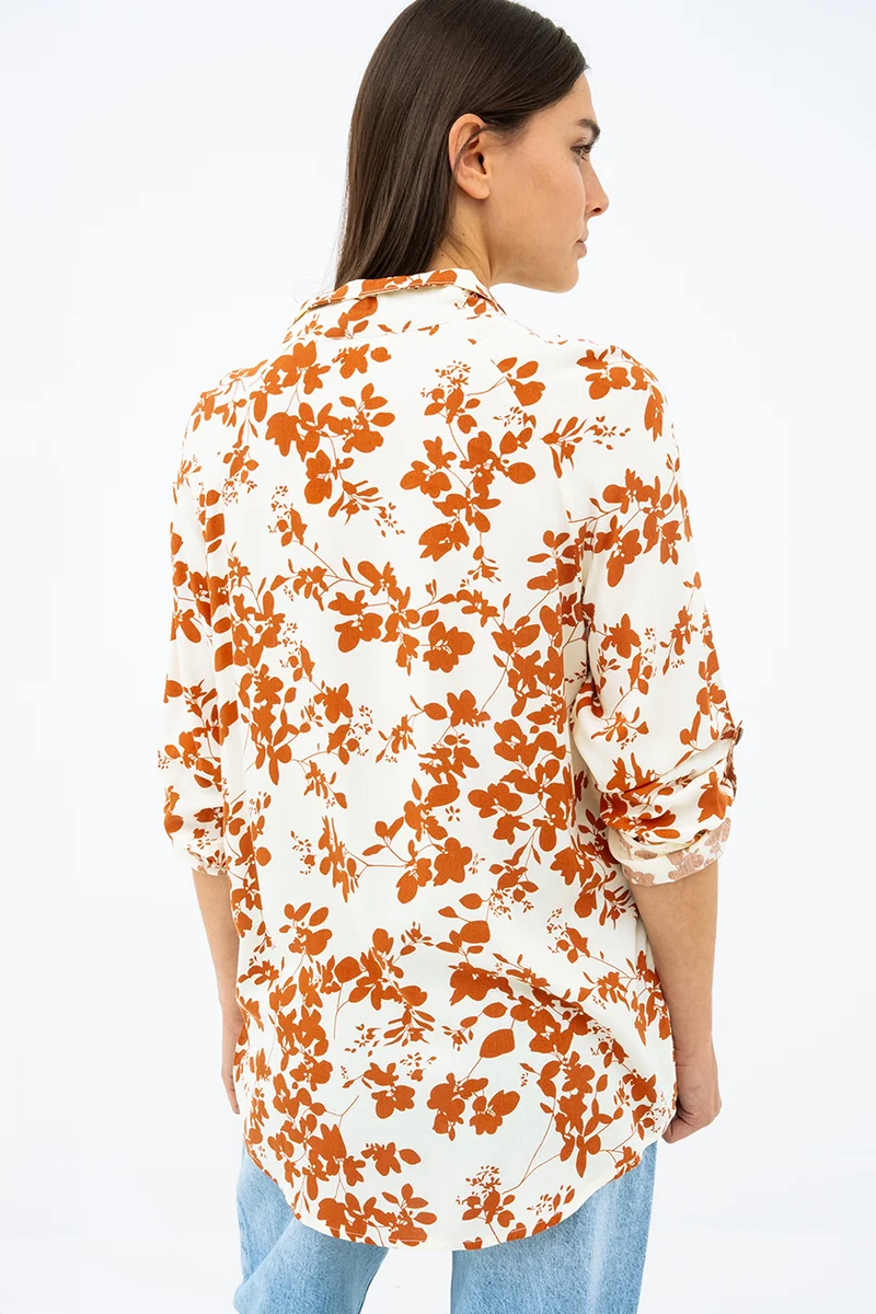 La blouse imprimée à manche raglan