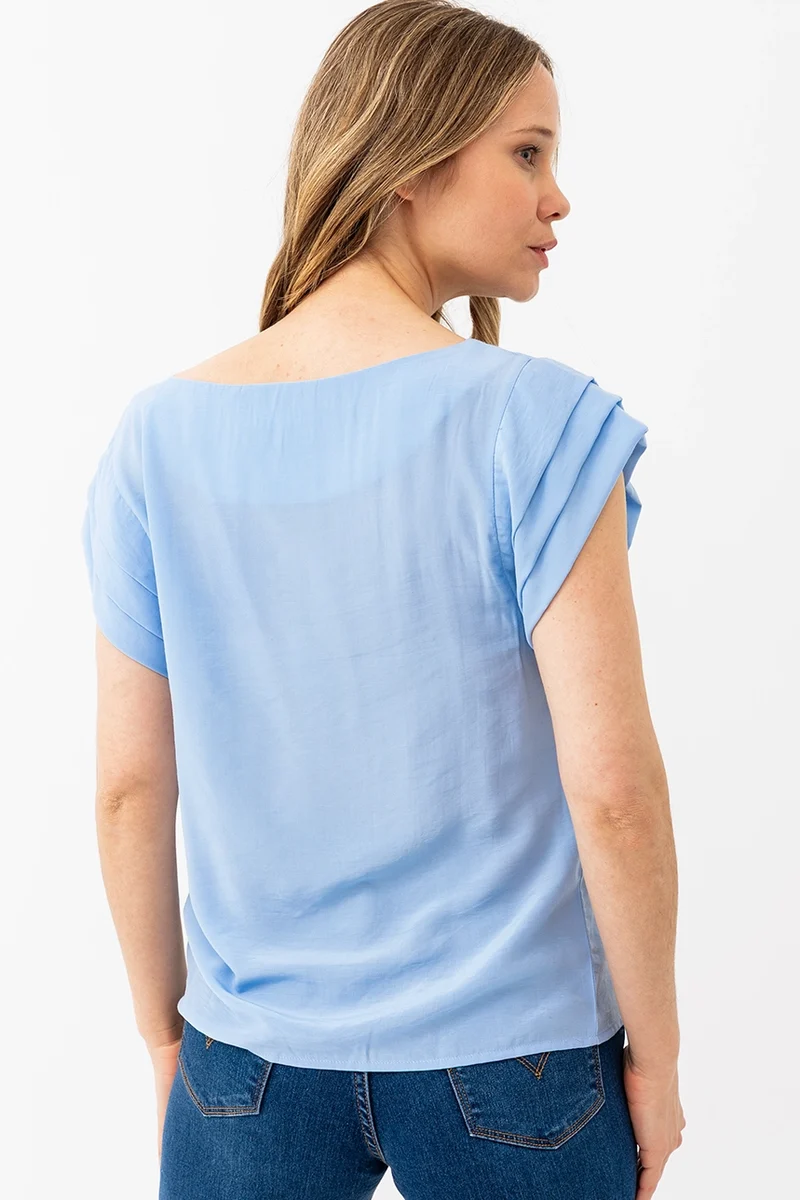 La blouse à mancherons unie