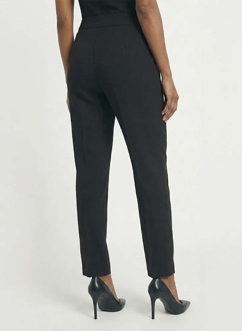 Le pantalon taille haute simple