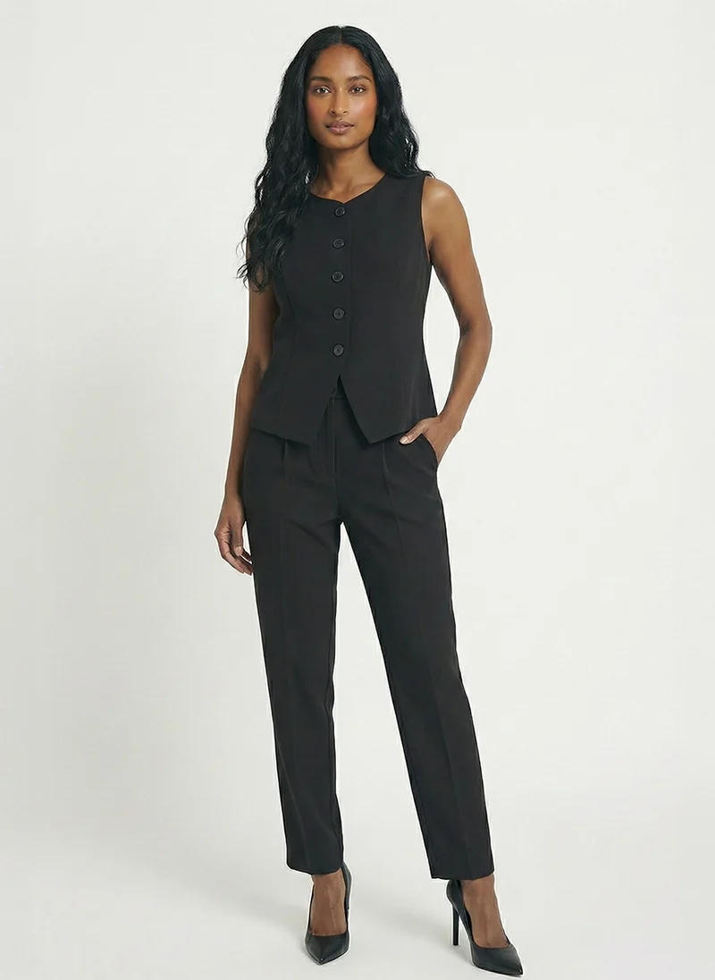 Le pantalon taille haute simple