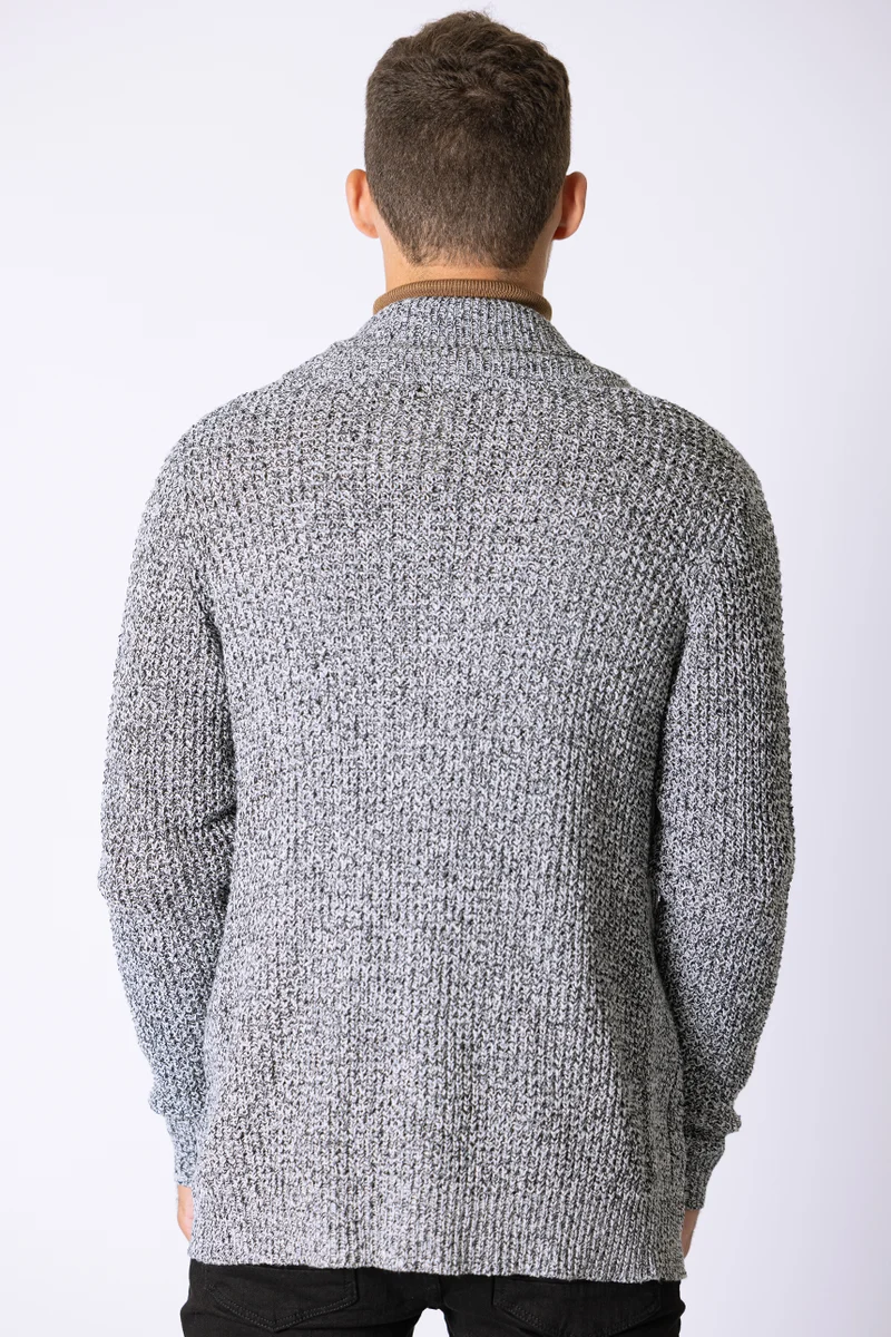 Le cardigan en tricot texturé