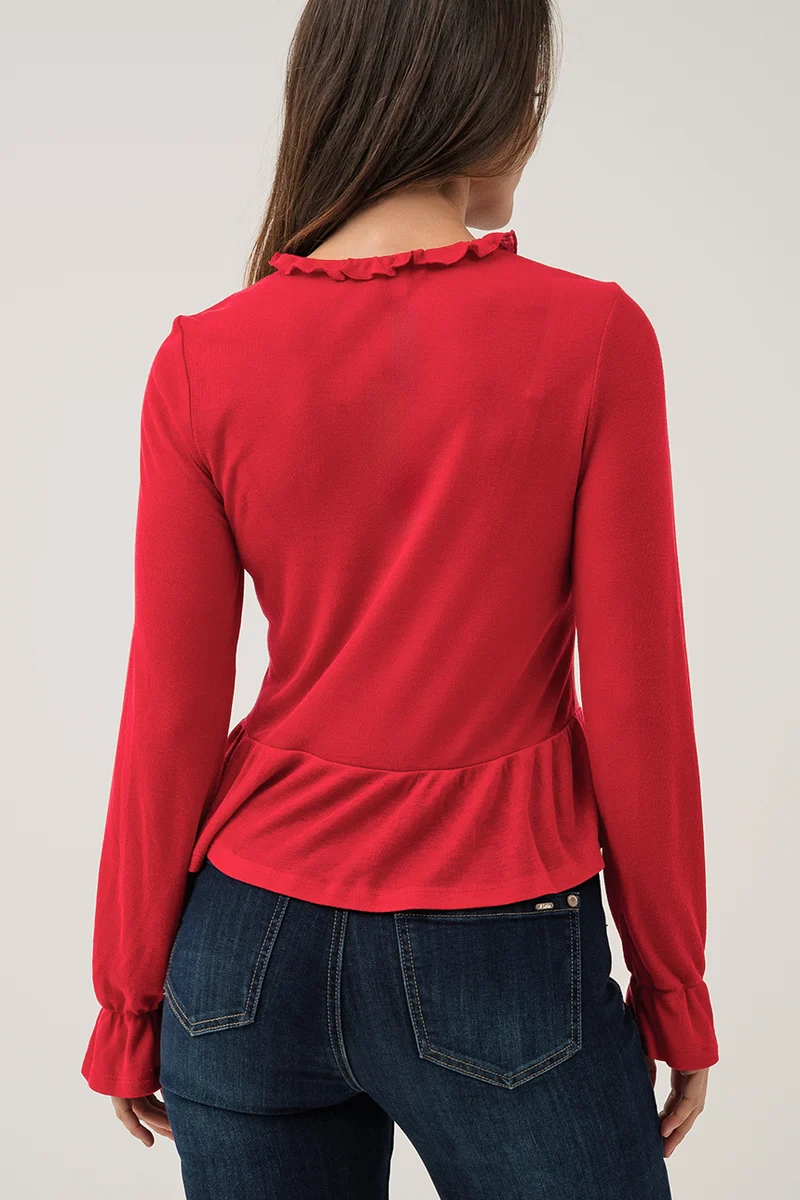La blouse t-shirt peplum à manches longues