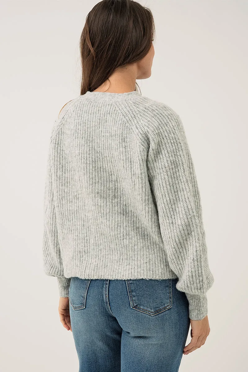 Le cardigan en tricot ample