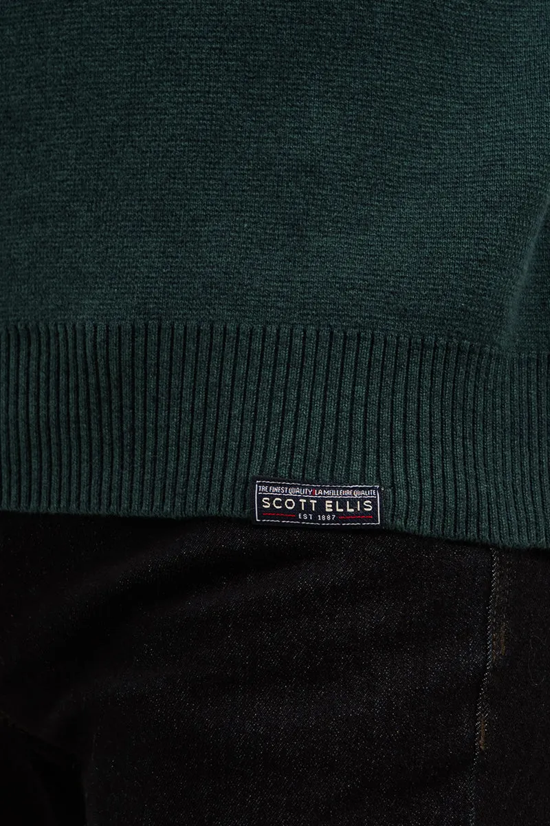 Le chandail en tricot de coton col montant avec fermeture éclair