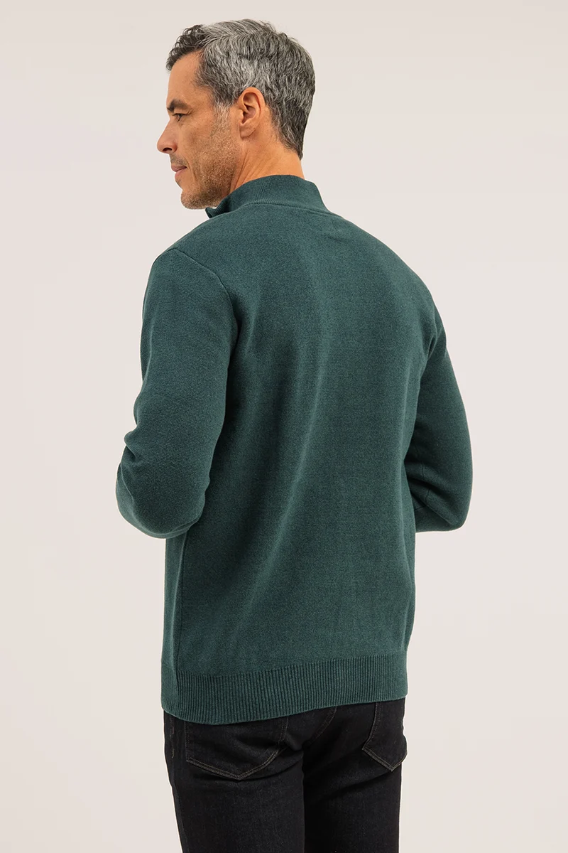 Le chandail en tricot de coton col montant avec fermeture éclair