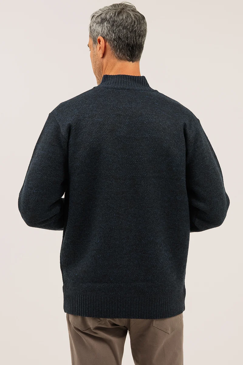 Le cardigan en tricot doublé en flanelle