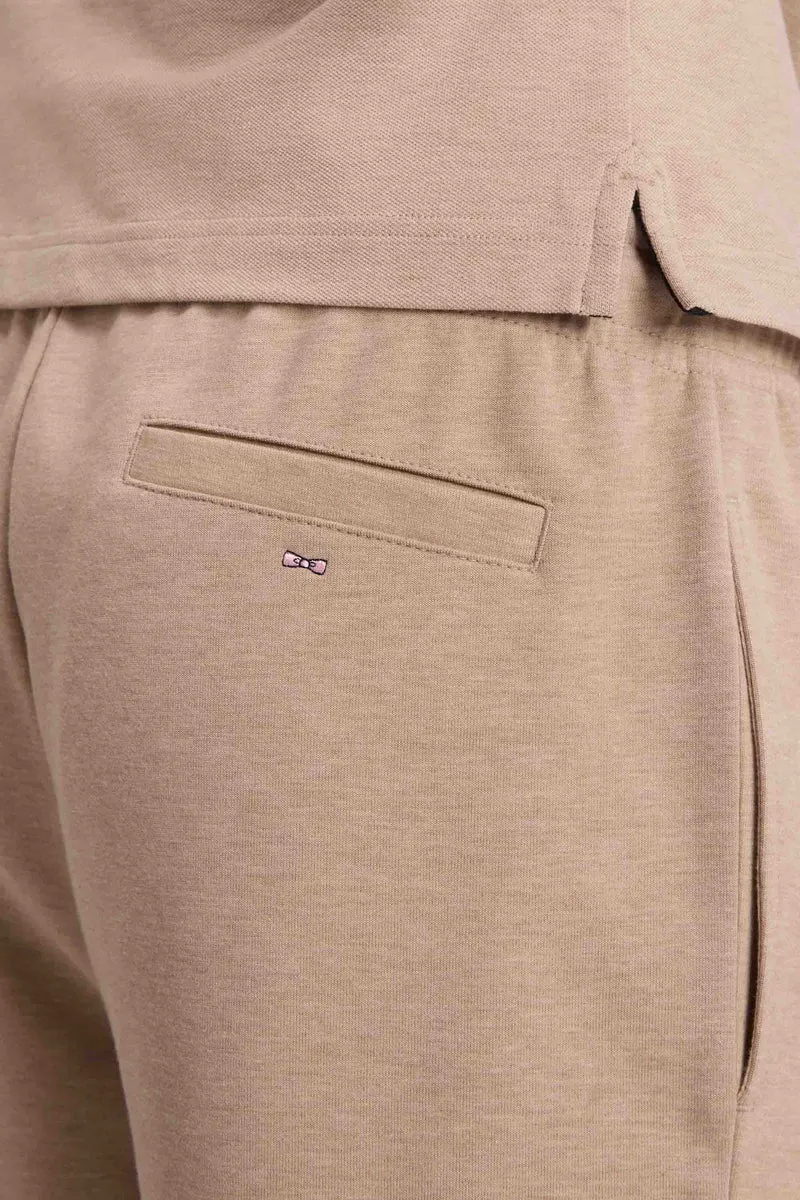 Jogging en interlock de coton stretch beige coupe droite