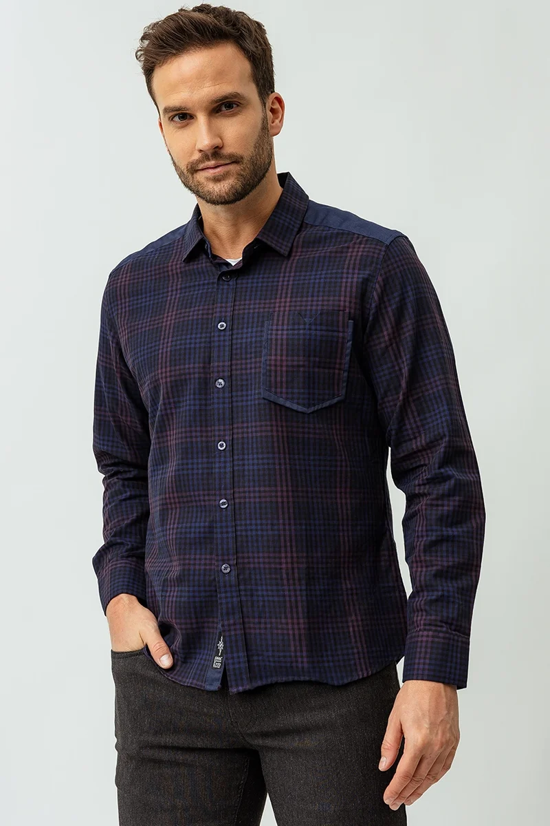 La chemise à carreaux bi-matière