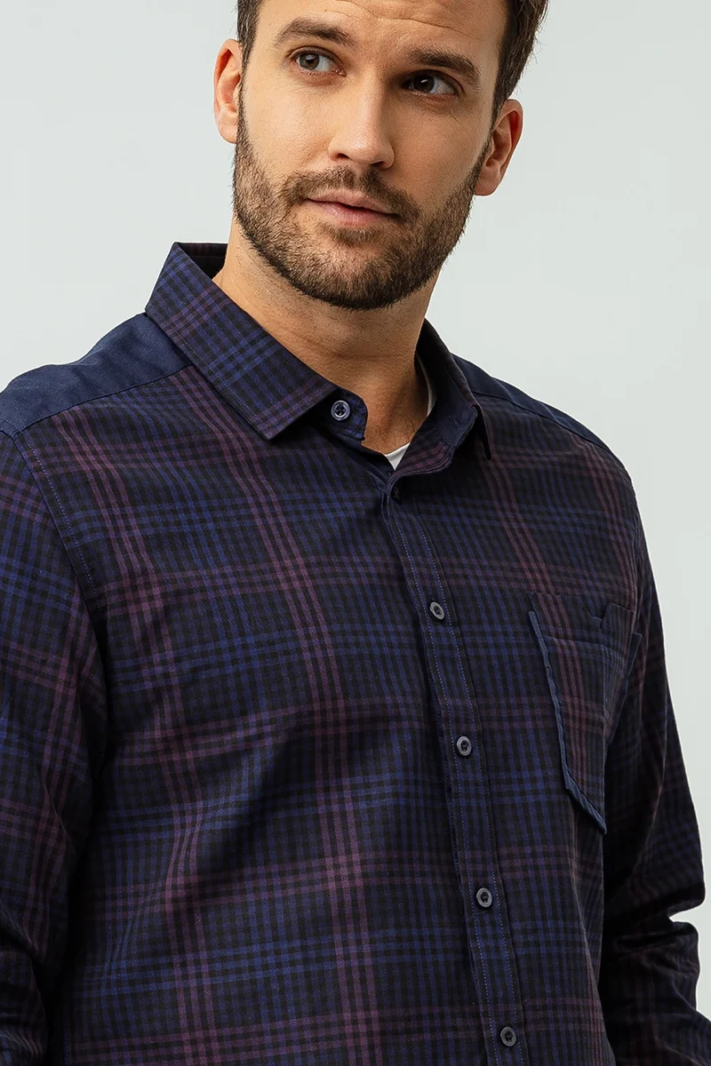 La chemise à carreaux bi-matière