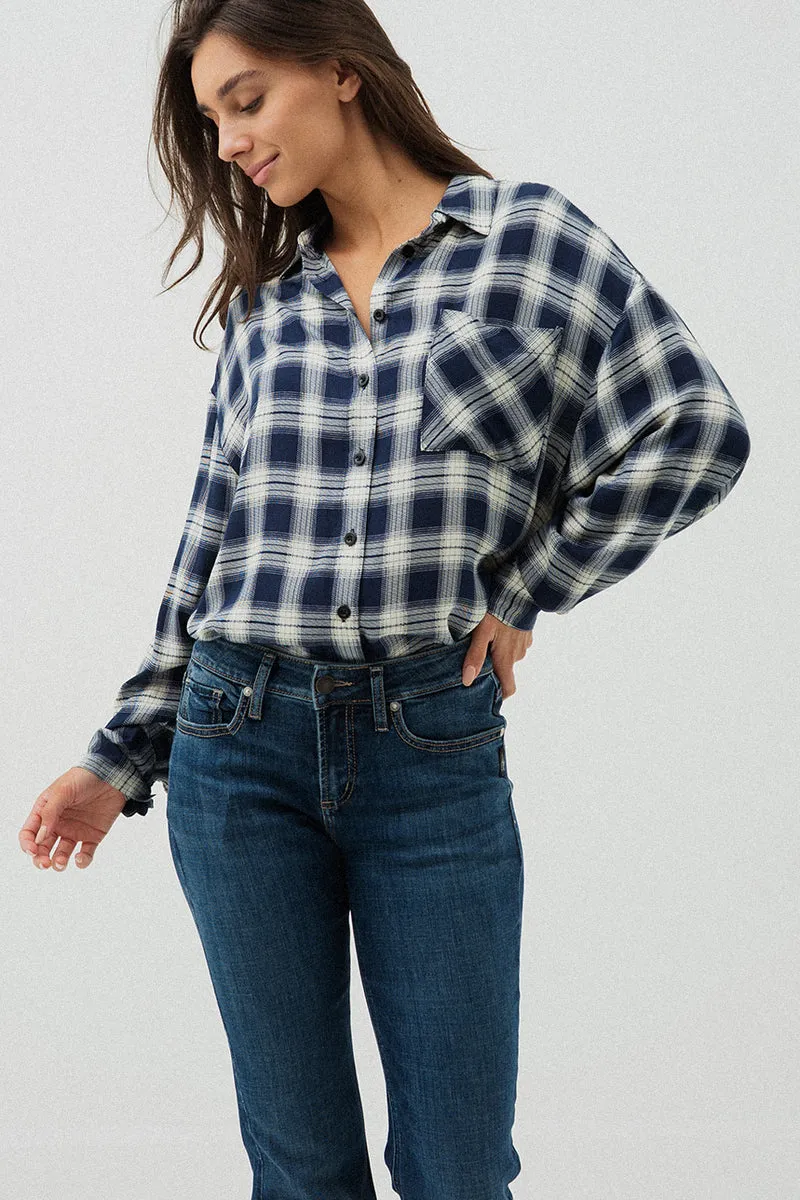 La blouse ample à carreaux
