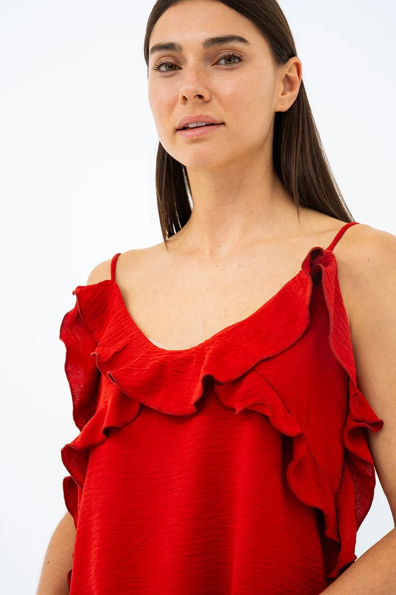 La camisole à volants fines bretelles