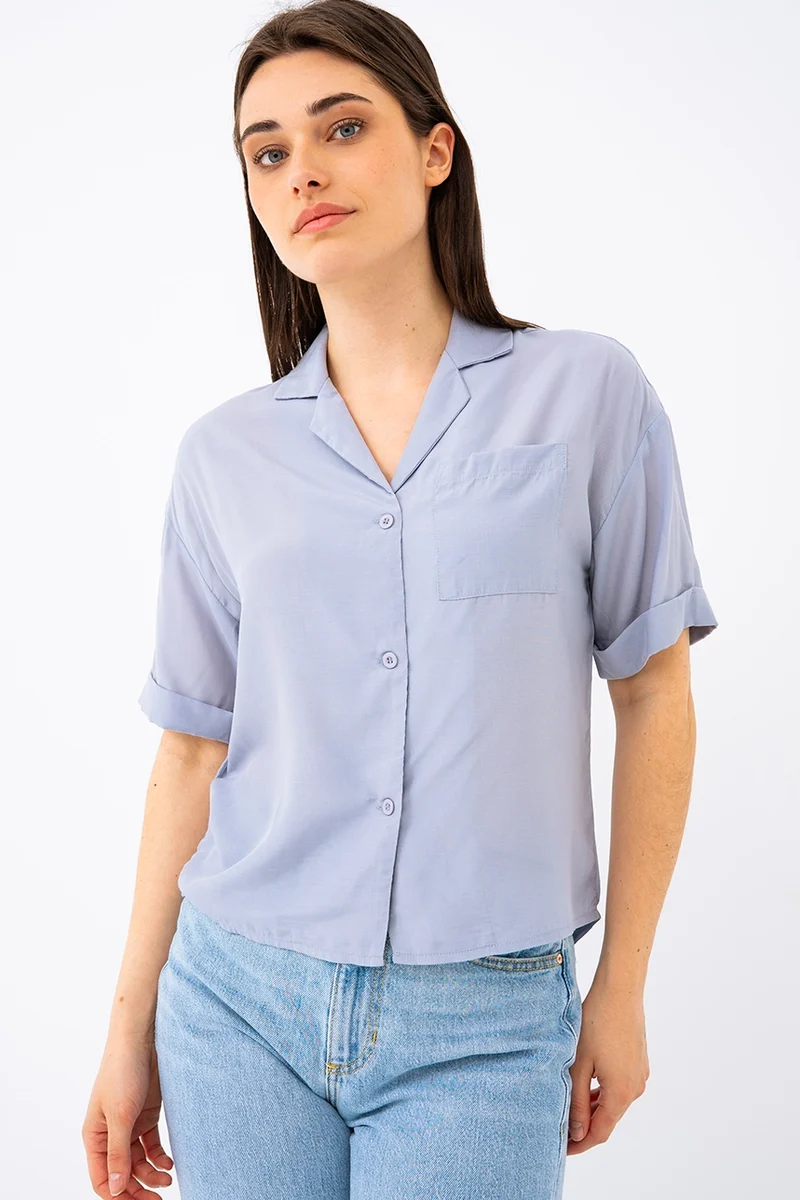 La blouse courte unie