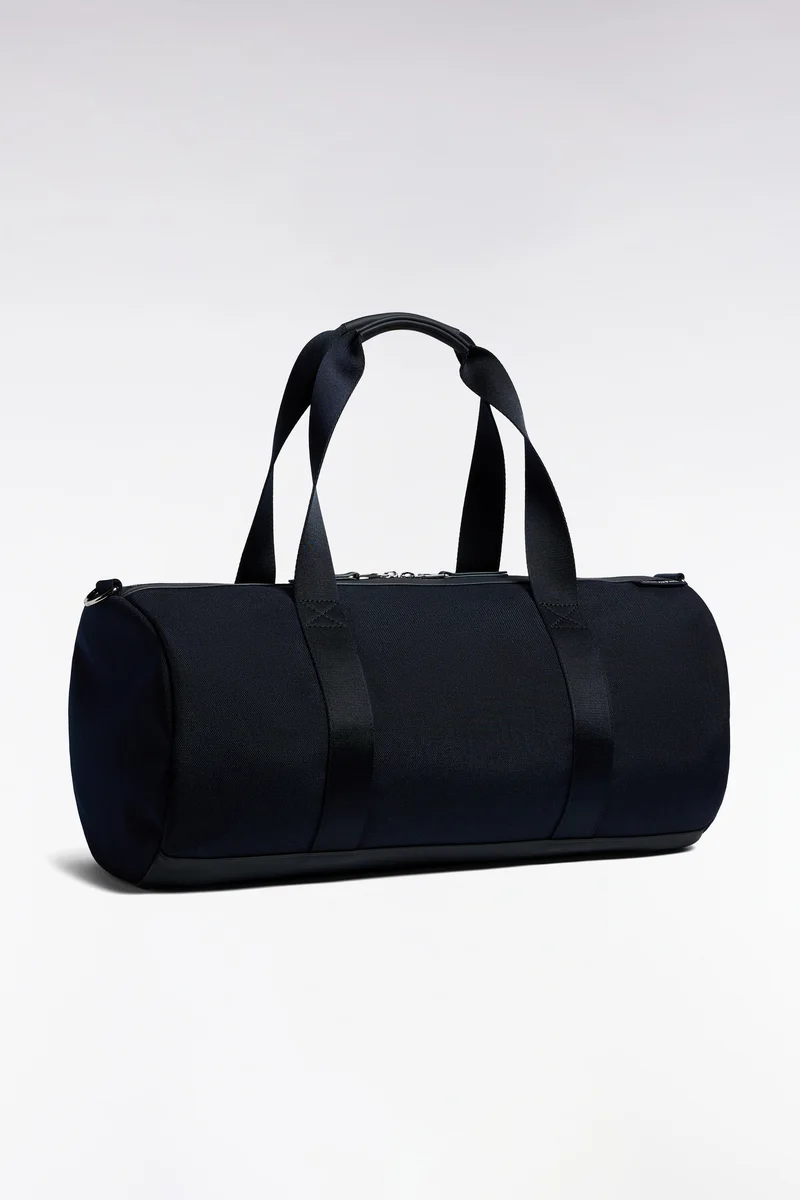 Sac de sport polochon en gomme et nylon marine