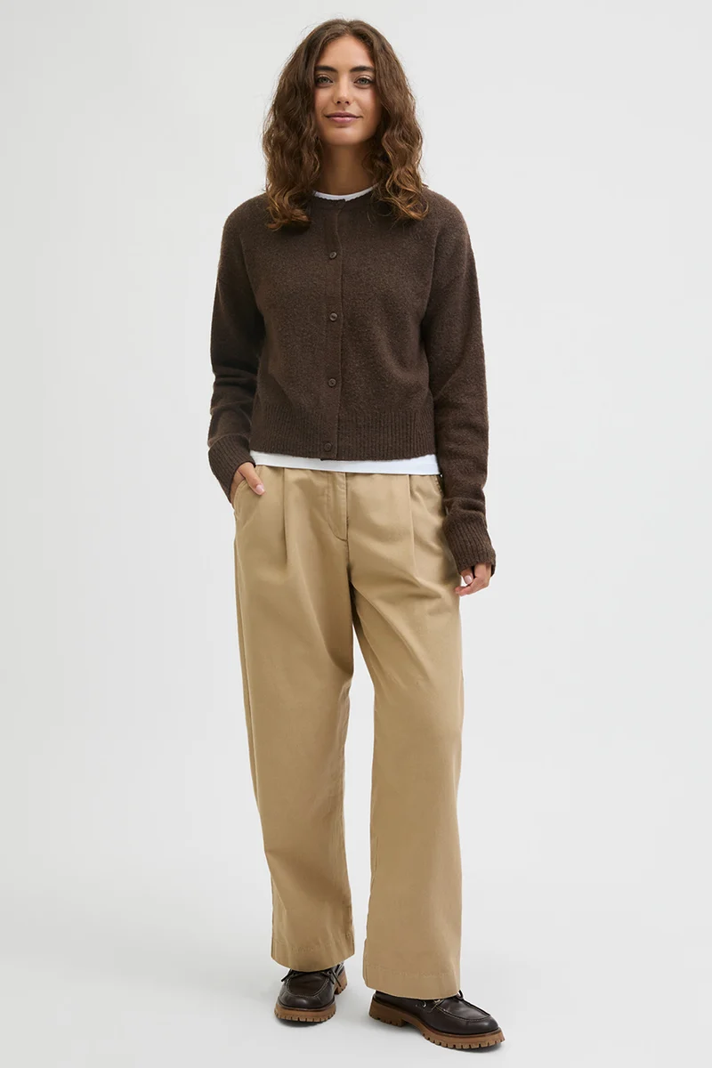 Le cardigan court en tricot