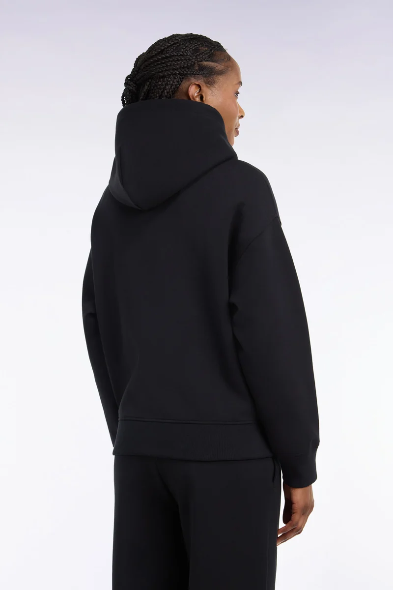 Sweatshirt à capuche unisexe en interlock noir coupe loose