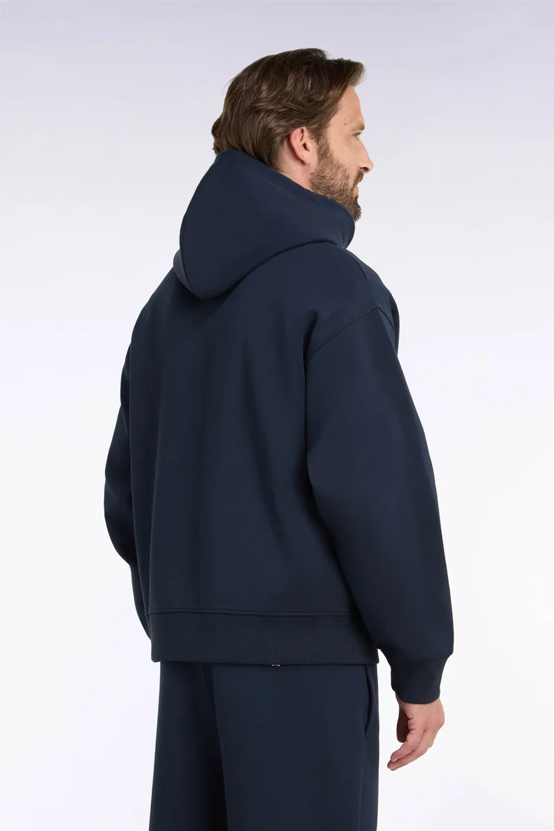Sweatshirt à capuche unisexe en interlock marine coupe loose