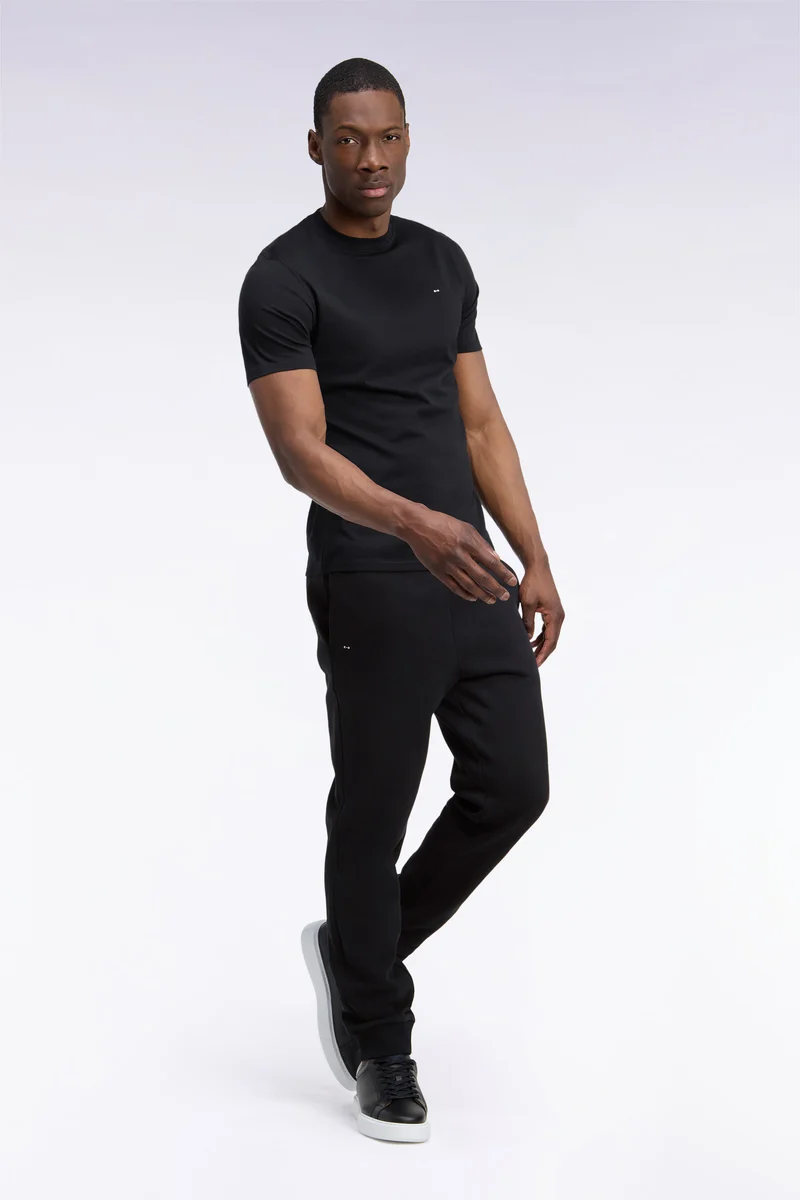 Jogging uni en molleton coton noir coupe droite