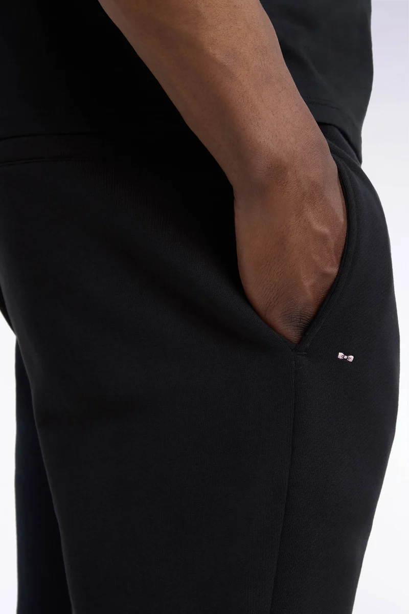 Jogging uni en molleton coton noir coupe droite
