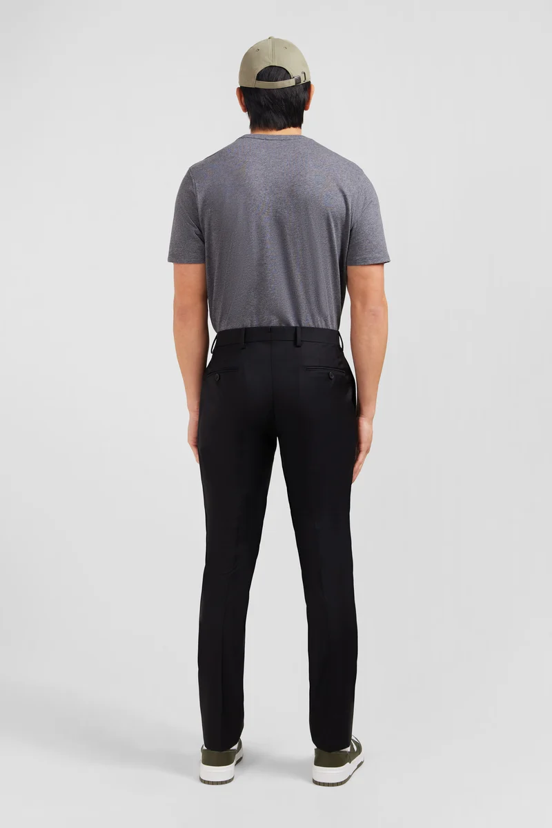 Pantalon slim noir en laine à plis cassés